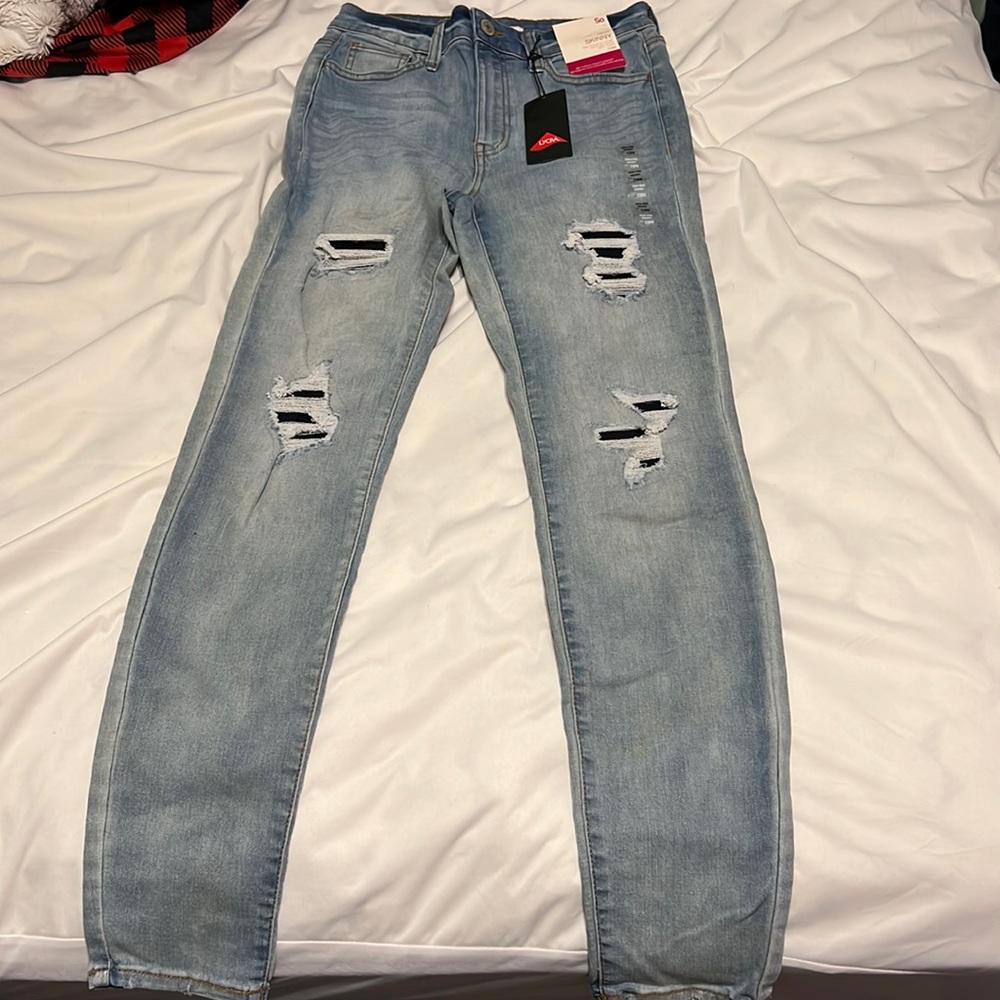 So high rise skinny jeans, light blue, patched rips, size 7/28w
